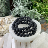 Mala Lava Stone Bracelet With Velvet Pouch