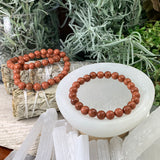 Mala Red Sandstone Bracelet With Velvet Pouch